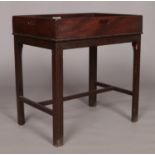 A 19th century mahogany tray to table raised on four square cut legs.