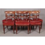 Seven 19th century mahogany dining chairs, includes one carver.