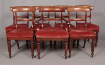 Seven 19th century mahogany dining chairs, includes one carver.