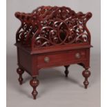 A Victorian style mahogany Canterbury. Having single drawer and turned supports. Height 70cm.