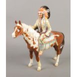 A Beswick figure modelled as a Native American chief on horseback. Approx. height 22cm. Slight