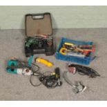 A collection of assorted hand and power tools to include Wicks profile sander, Hitachi hammer drill,