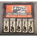 Rolling Stones Plastic Guitar Brooches, each featuring band member, backed on card.