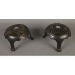 A pair of bronze sword/rapier cup shaped cross guards.