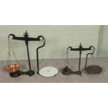 Two sets of antique balance scales include W.T Avery examples featuring ceramic plate.