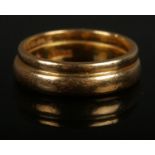 Joined 22ct gold wedding bands. Size L 1/2, 8.53g.