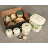 A box of mostly enamel ware. Includes bread bin, storage jars etc.