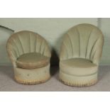 Two bedroom chairs, in sage velvet upholstery with shell back and fringed base. Both raised on