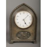 A French white metal presentation mantel clock featuring cherub motif with French movement.