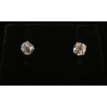 A pair of 18ct white gold diamond stud earrings. Each diamond approximately 0.3ct.