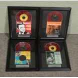 Four Elvis Presley limited edition framed vinyl singles from Collector's World, all with