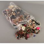 A large bag of costume jewellery.