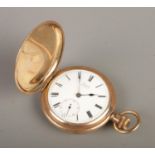 A Prescot gold filled full hunter pocket watch with enameled Roman Numeral face. Glass is missing