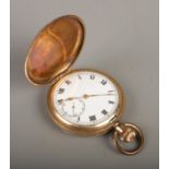 An Elgin gold plated full hunter pocket watch. In working order.