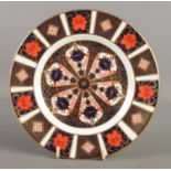 A Royal Crown Derby Imari pattern plate, 1128. 22cm diameter.