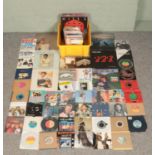 A collection of rock and pop records, comprising of a small selection of albums and a good