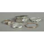 Five silver rings. Includes paste set examples, mother of pearl and one band.
