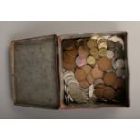 A quantity of pre decimal British coins including two shilling, one shilling, sixpence, one penny,