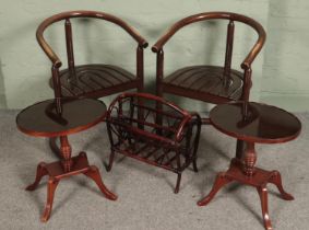 A pair of oak bentwood armchairs along with a bamboo magazine rack and pair of glass top