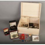 A box with contents of mostly assorted costume jewellery and wristwatch to include Accurist, novelty