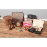 One box and two small vintage suitcases of miscellaneous to include Indian brass bookends,