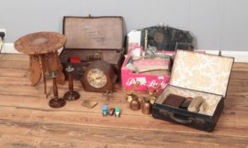 One box and two small vintage suitcases of miscellaneous to include Indian brass bookends,