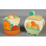 Two Clarice Cliff preserve pots. Includes Gay Day and Sun Gleam Crocus designs.