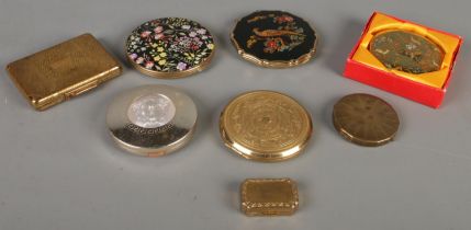 A quantity of compacts. Includes Stratton, Versace, etc.