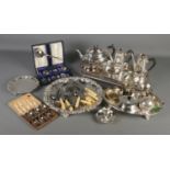 A box containing a large quantity of silver plated items. Includes WMF egg cup stand, cased cutlery,