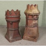 Two treacle glazed stoneware chimney pots with crown tops. Tallest 89cm.