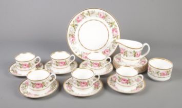 A Royal Worcester "Royal Garden" pattern part tea set. Comprising of six cups, saucers, side plates,