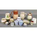 A quantity of ceramics. Includes Doulton Lambeth jug, motto ware, blue & white cups & saucers, Royal