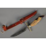 A Jowika Solingen hunting knife with hoof handle and leather scabbard. Length of blade: 12cm. CANNOT