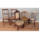 Five chairs. Includes carved mahogany hall chair, pair of Edwardian bergÃ¨re seat bedroom chairs,