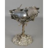 A silver plated pedestal bowl decorated with vines. Height 24cm. One leaf damaged, in need of