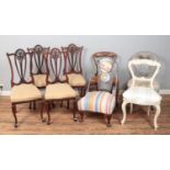 Eight assorted chairs, to include a set of four Hepplewhite style dining chairs and unusual metal