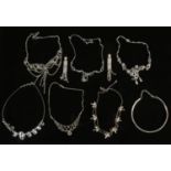 A selection of paste jewellery including necklets and earrings.