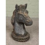 A cast concrete model of a horses head. Height 49cm.