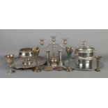 A collection of silver plated items, to include heavy three branch candlestick, vases, serving trays