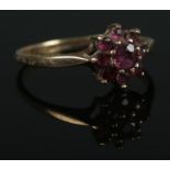 A 9ct Gold and ruby cluster ring. Size M. Total weight: 1.3g