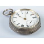 A silver pocket watch, with engine turned back and Roman Numeral dial. Case assayed for
