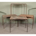 Four vintage school desks, with tubular steel bases. Tops of tables need restoration/replacing.