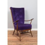 Lucian Ercolani for Ercol; a dark beech/elm high spindle back armchair. Model Number 478. With