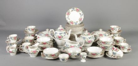 A large collection of Booth's dinnerwares in the 'Floradora' pattern. To include dinner plates,