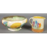 Two Clarice Cliff ceramics. Includes Crocus pattern jug and Citrus pattern bowl. Large crack to