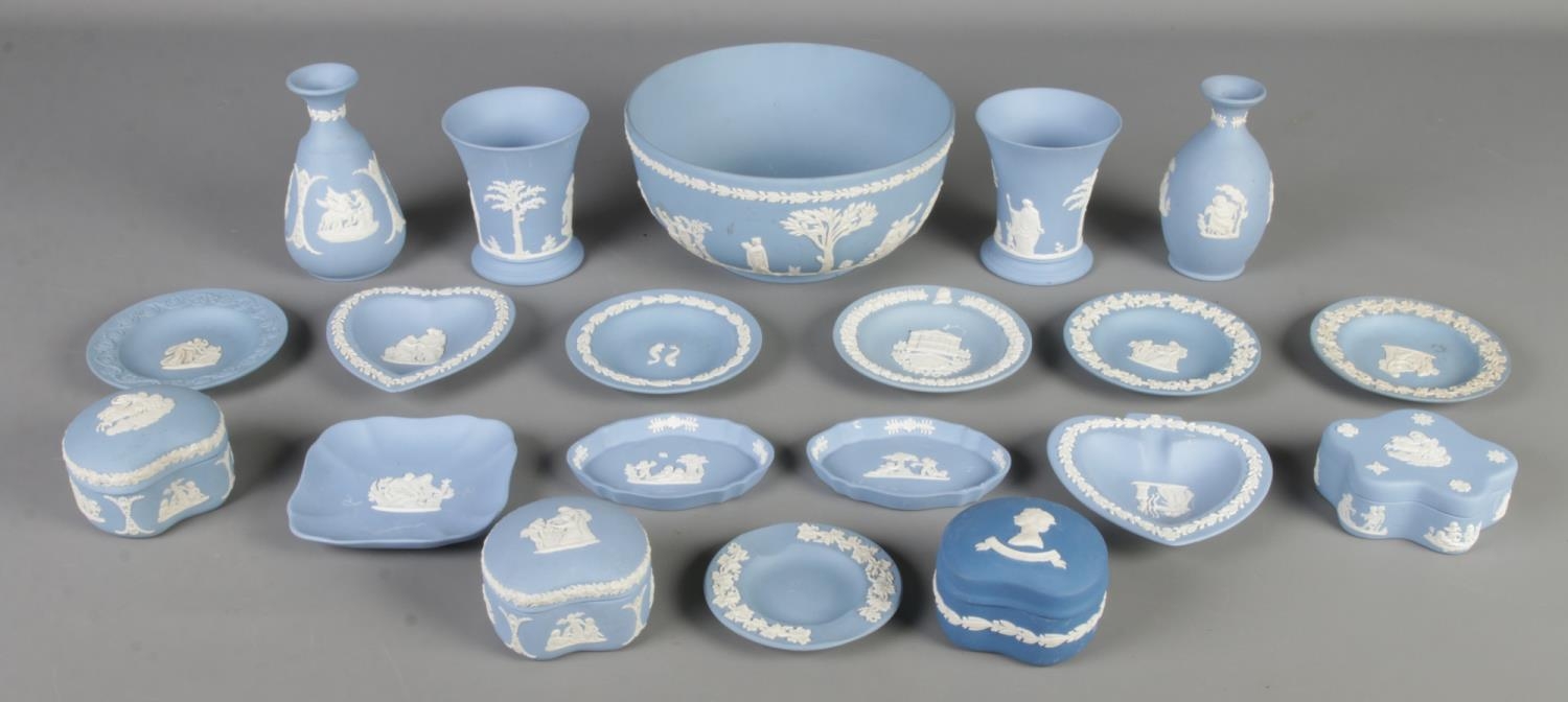 A quantity of Wedgwood blue & white jasperware. Includes bowl, trinket dishes, vases, etc.