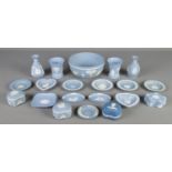 A quantity of Wedgwood blue & white jasperware. Includes bowl, trinket dishes, vases, etc.