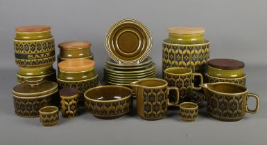 A collection of Hornsea dinnerwares in the Heirloom pattern. Includes storage jars, plates,