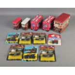 A collection of unopened ERTL diecast vehicles mostly Batmobile models and one Postman Pat Mail