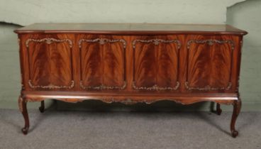 An antique style sideboard radiogram. Fitted with a Hacker RG200A radio and Garrard Sychro Lab